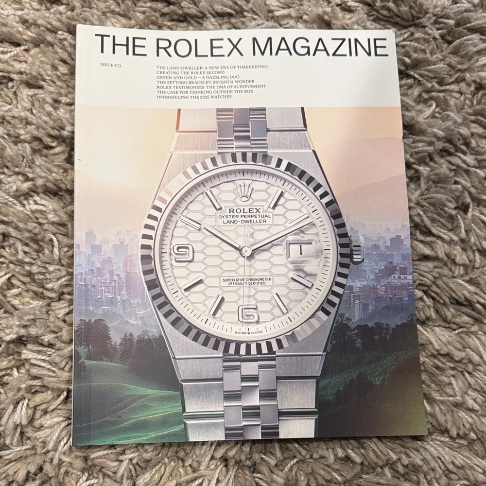 Rolex Silver and White Watch Cover Magazine